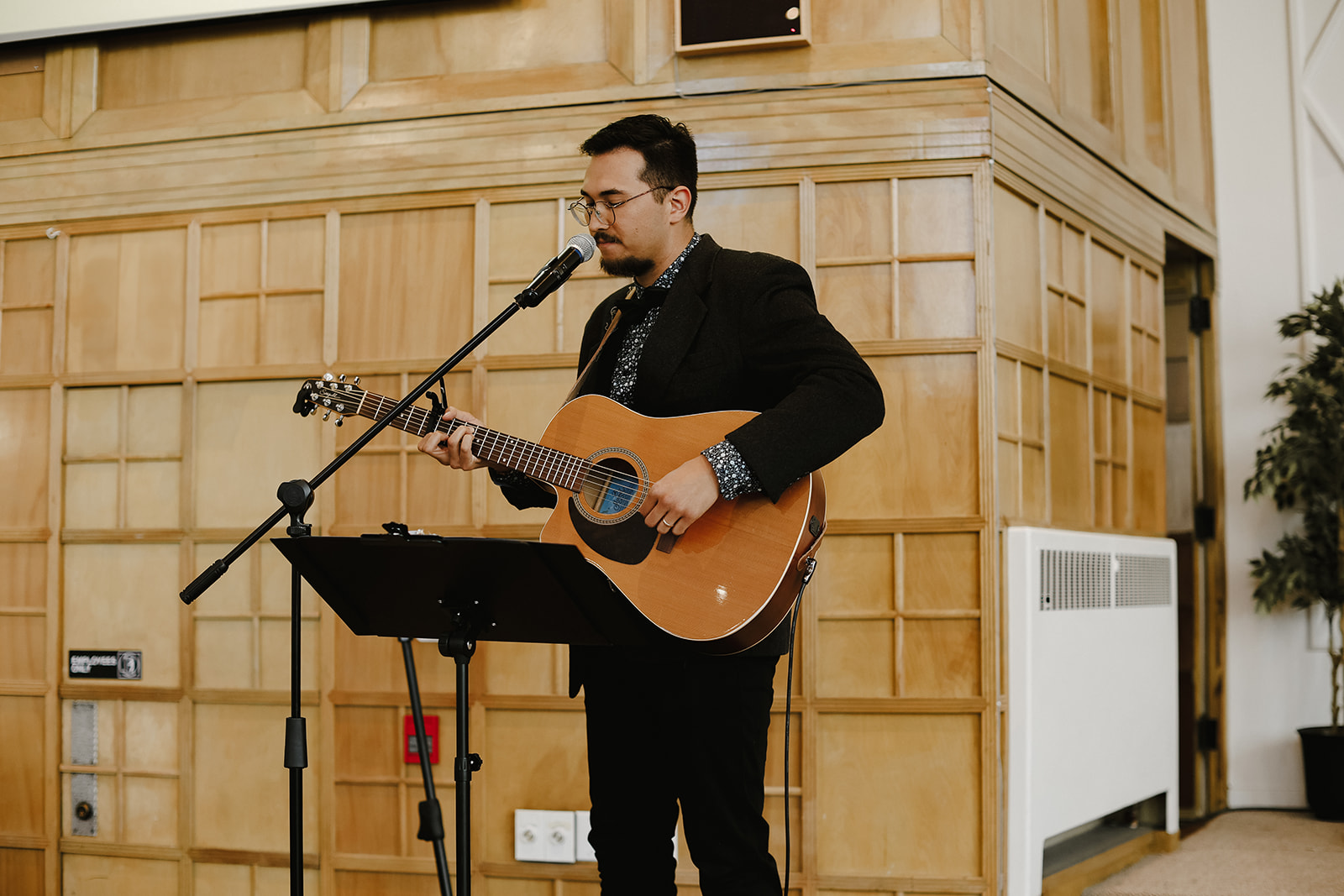 musician plays guitar 