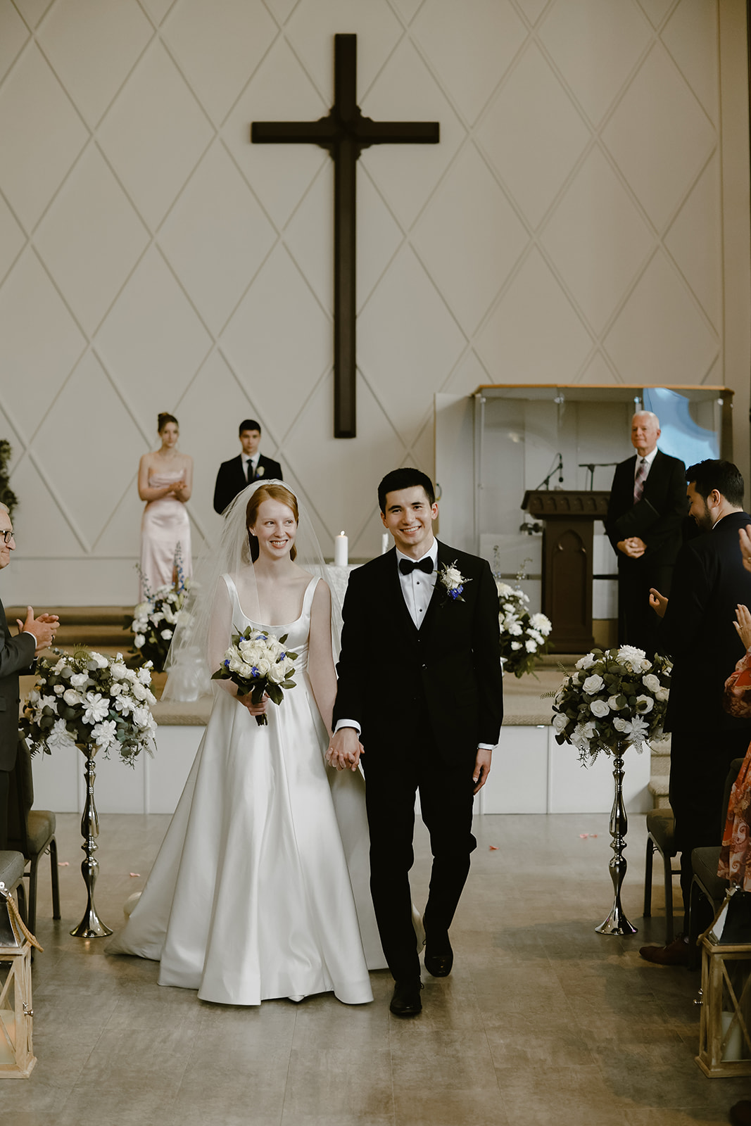 Bride and Groom walk down the aisle. 