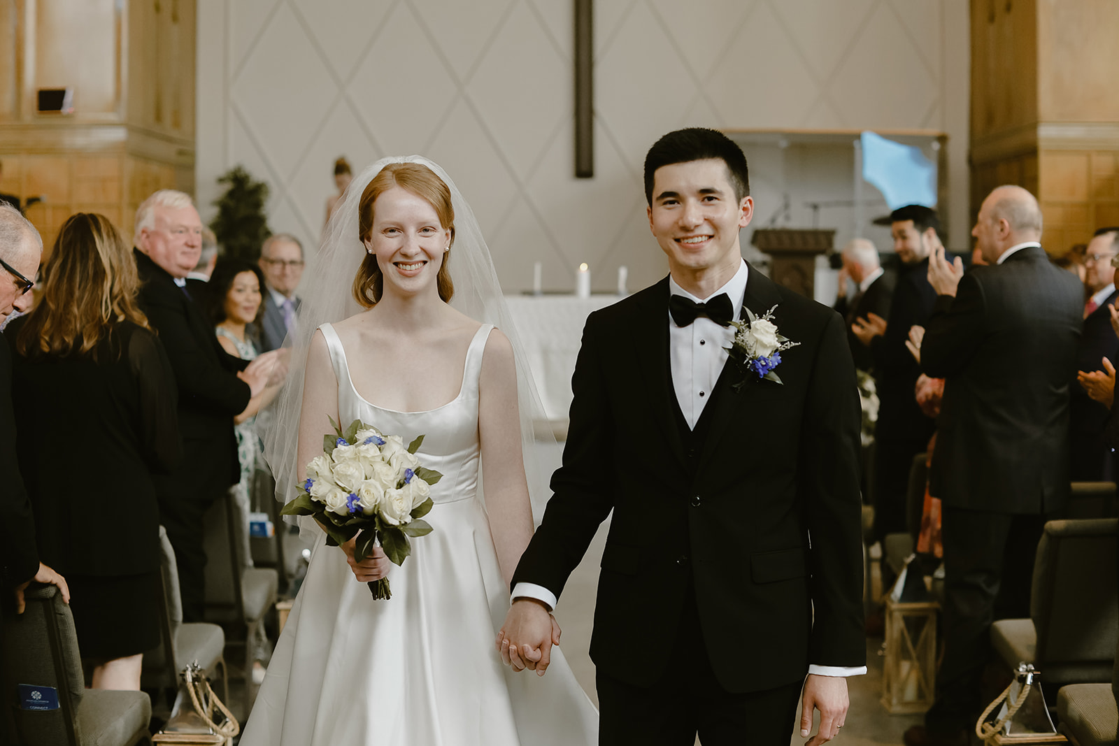 Bride and Groom walk down the aisle. 