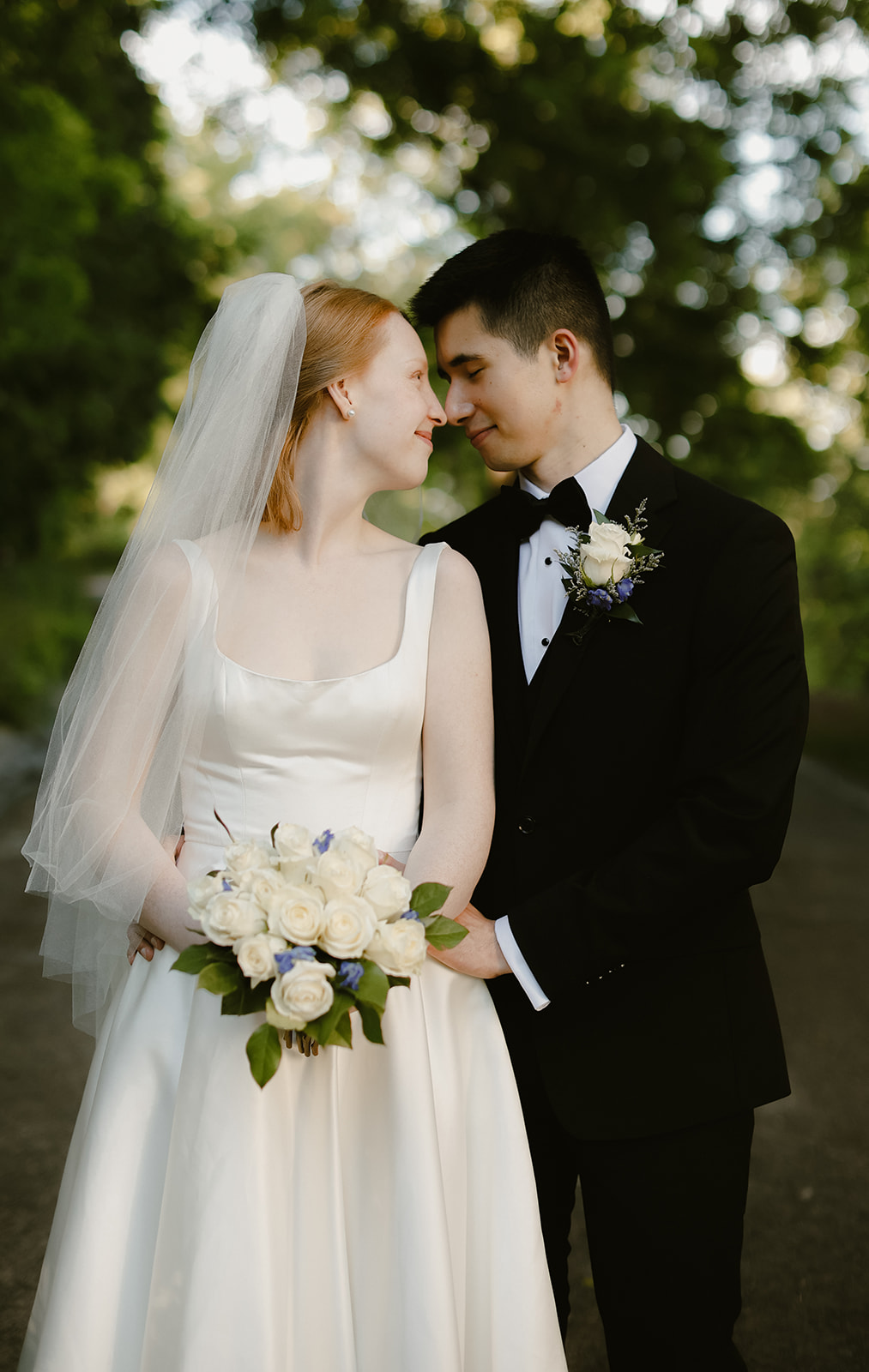 Bride and Groom in close embrace. 