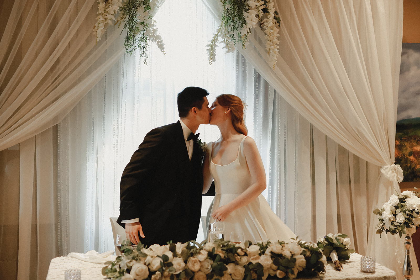 Bride and groom kiss. Kingston ON photography