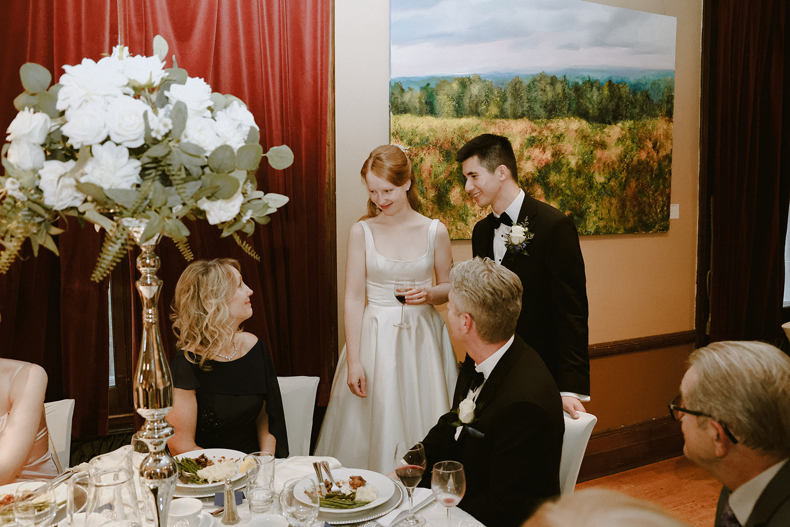 Bride and groom talk to guests. Kingston ON photography