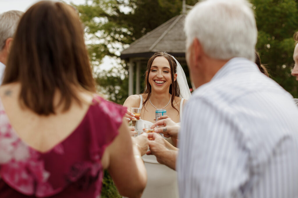 Bride takes a shot - Wedding Photography - Kingston ON