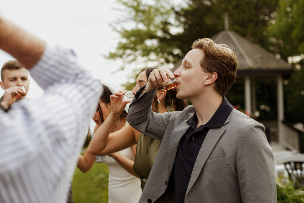 Man takes a shot - Wedding Photography - Kingston ON