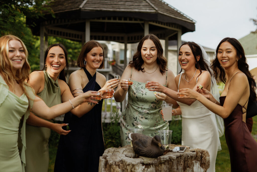 Bride and friends take a shot - Wedding Photography - Kingston ON