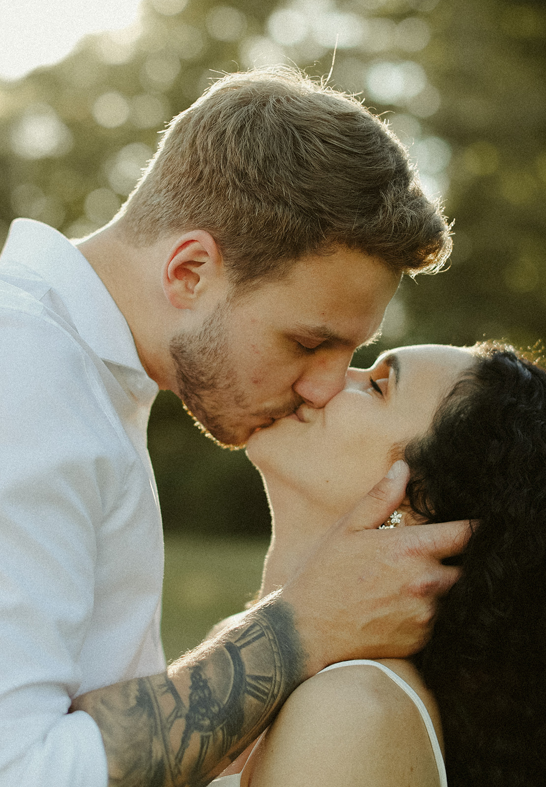 man and woman kiss. Kingston Ontario photography 