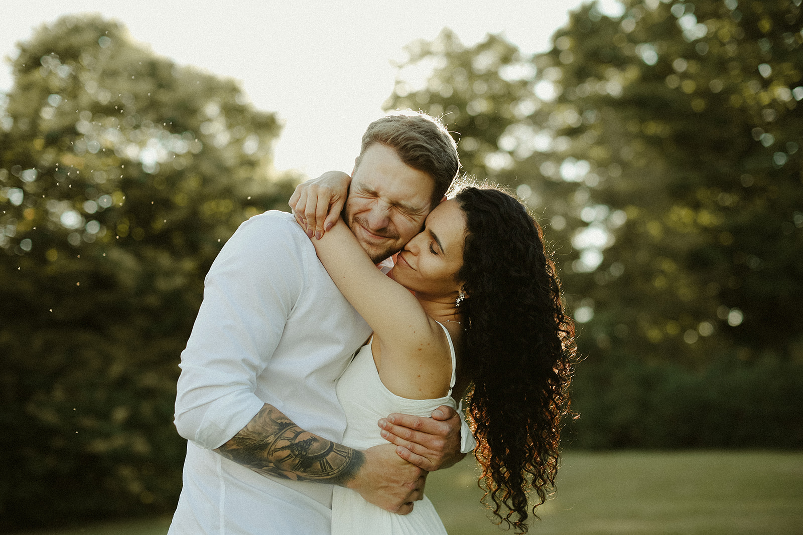 man and woman hug. Kingston Ontario photography 