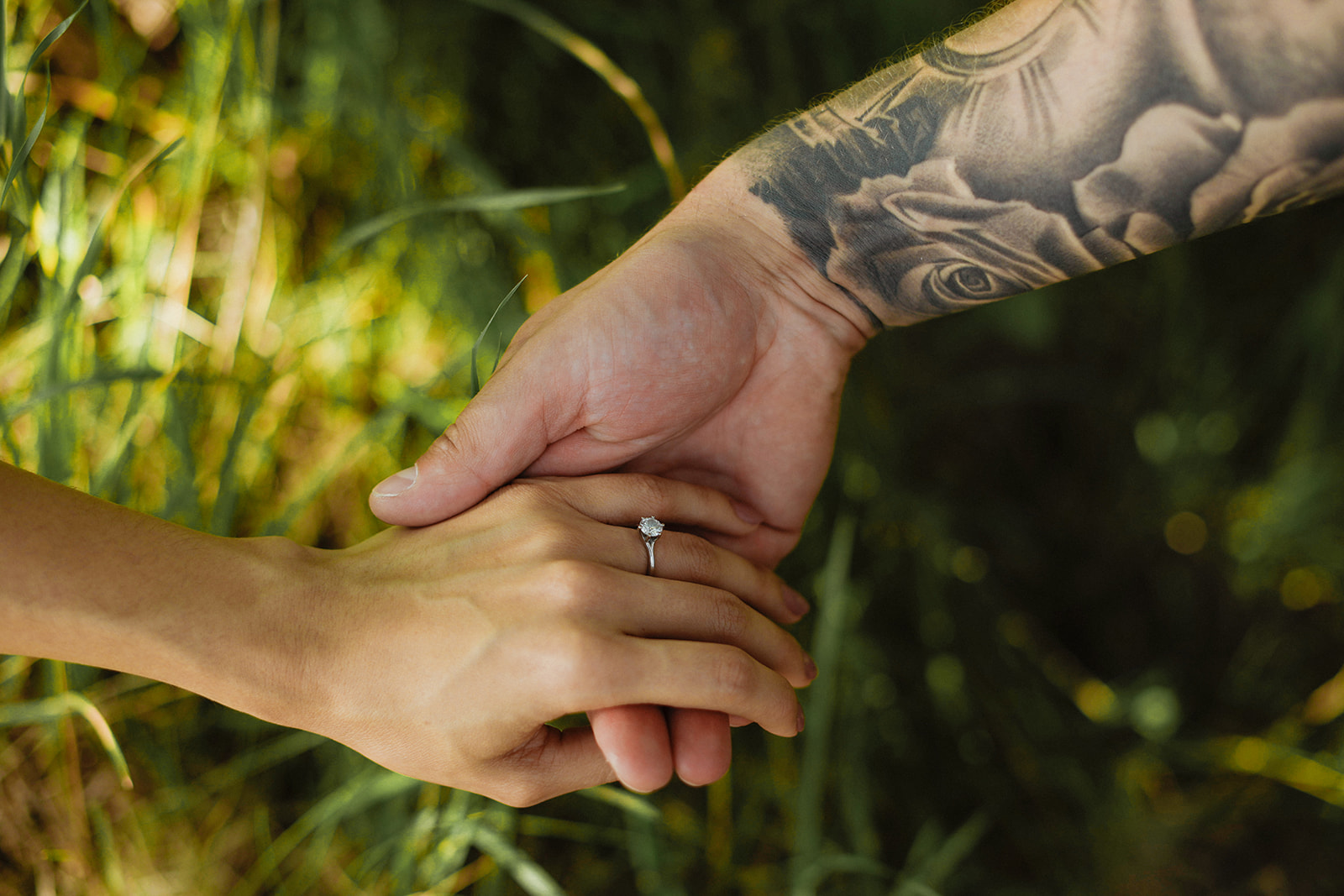 Close up on ring and hand. Kingston Ontario Engagement photography.