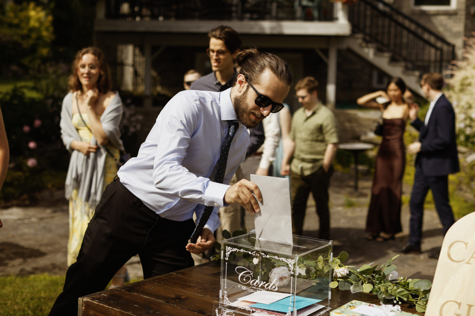 Guest puts card in box. Wedding Photography - Kingston ON