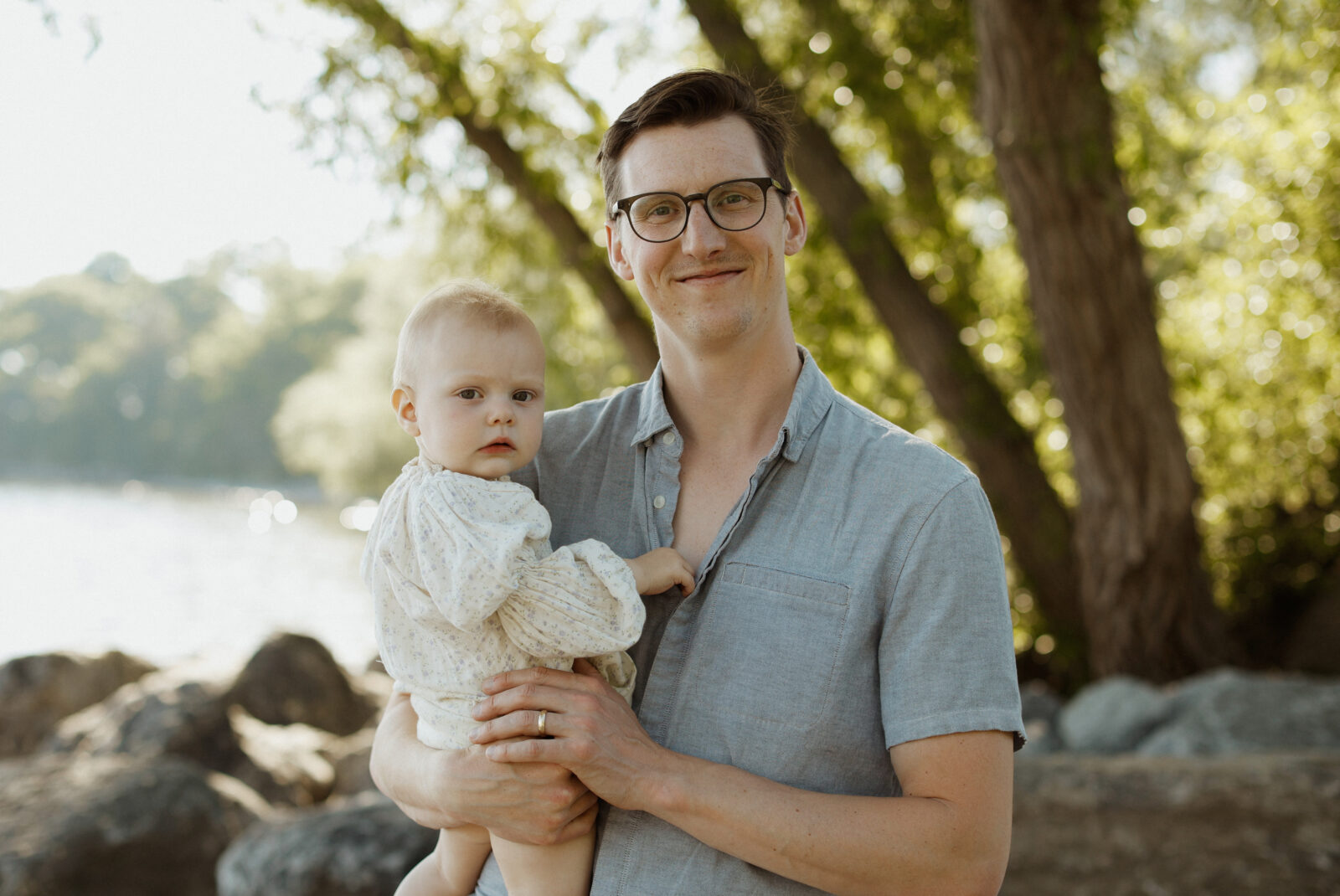 Father holds baby daughter - Kingston Ontario 