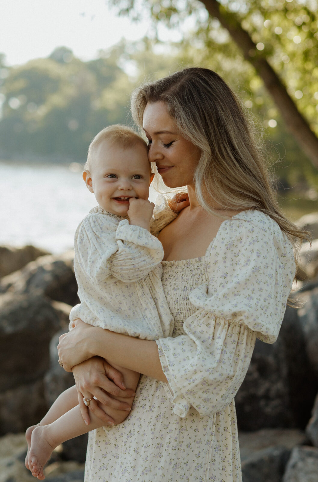 Mother holds baby daughter - Kingston Ontario 