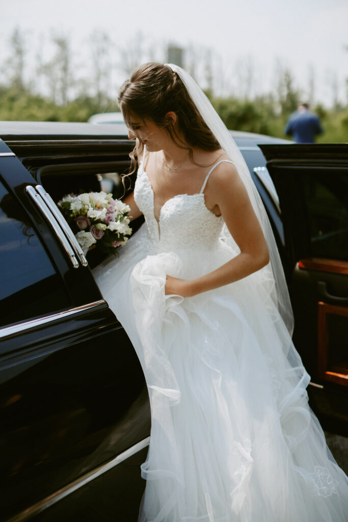 Bride gets in limoscene