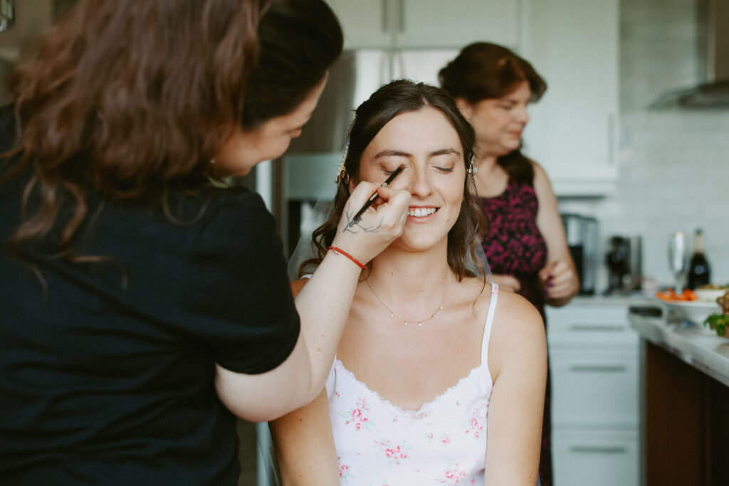 Bride getting her makeup done