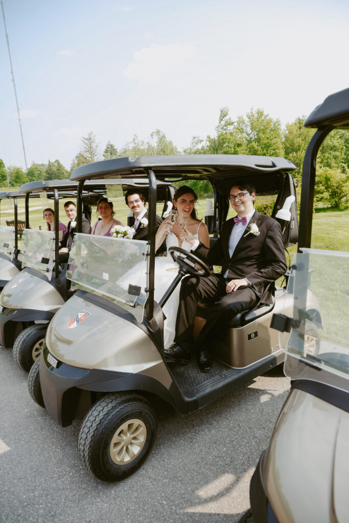 bridal party in gold carts