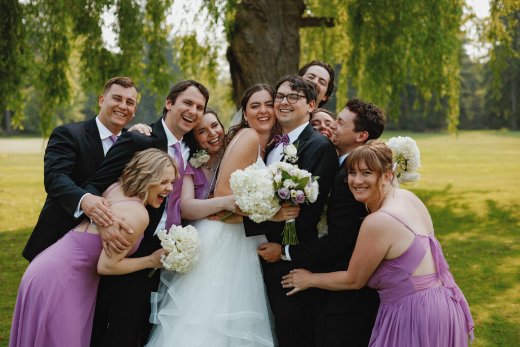 bridal party group hug