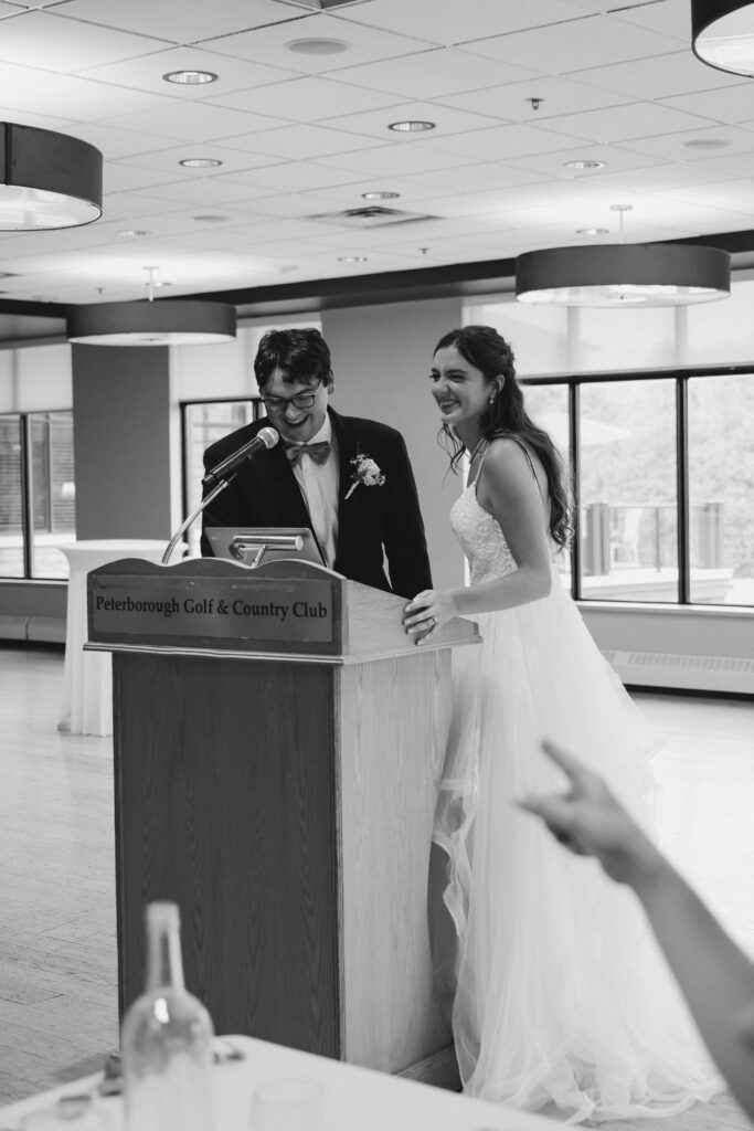 Bride and Groom give a speech. 