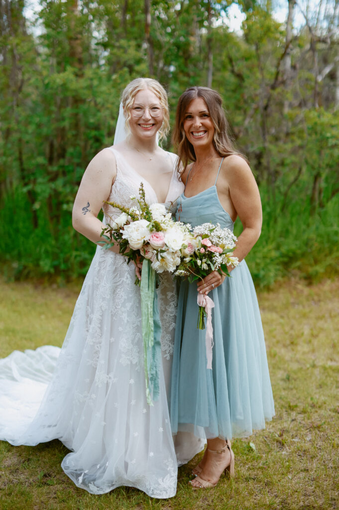Bride and Bridesmaid in blue dress