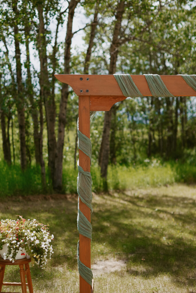 Close up on alter with green ribbon wrapped around it.