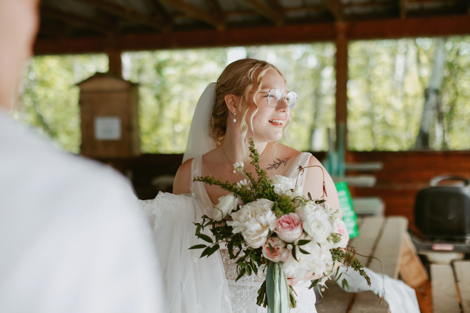 bride holds flowers