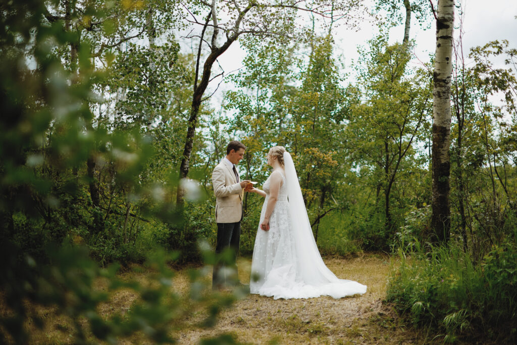Groom reads vows to bride
