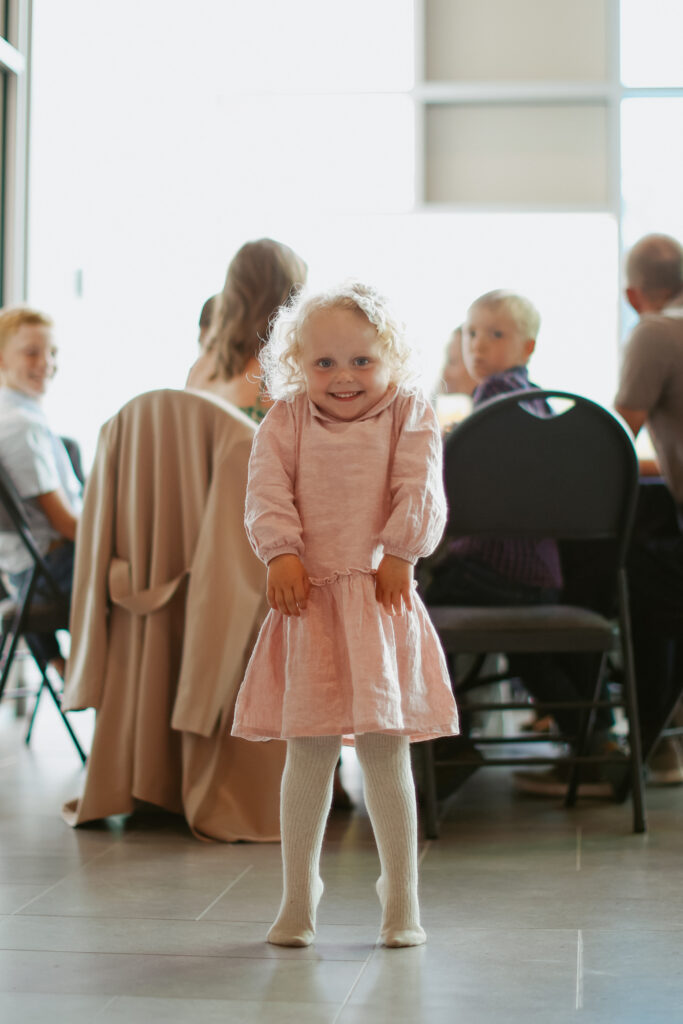 child smiles at camera 