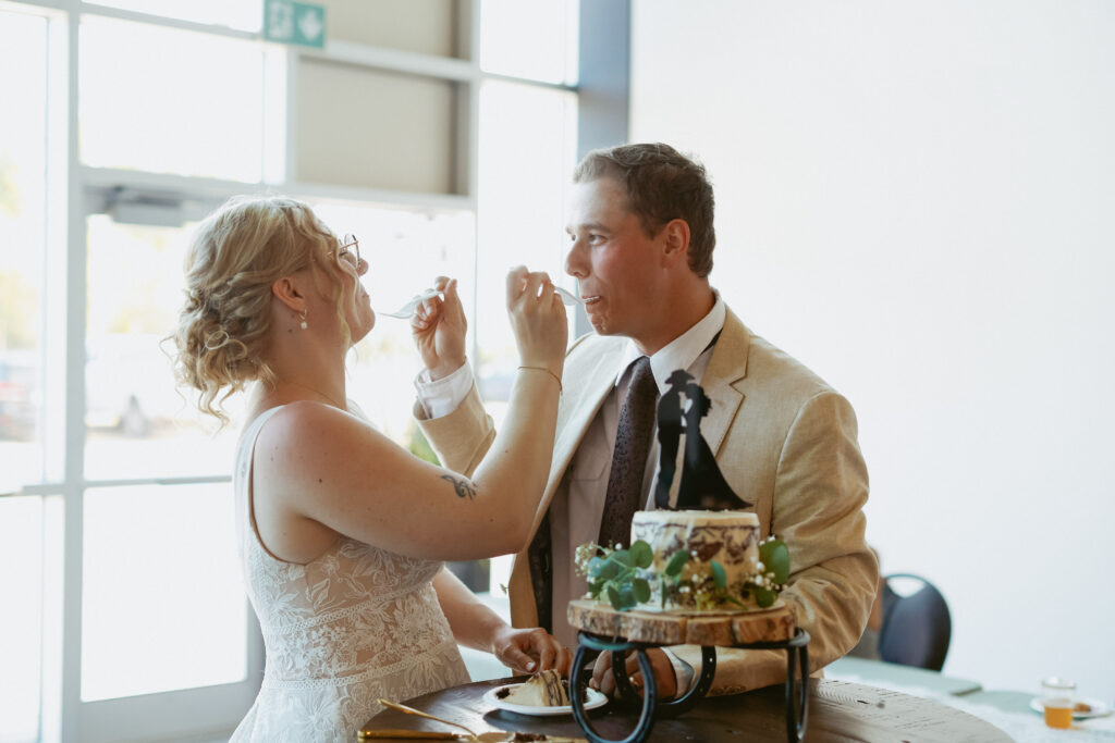 Bride and groom fed each other cake