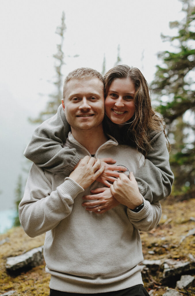 Couple smiles at camera 