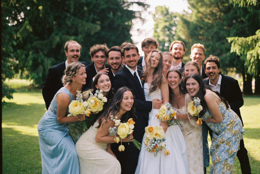 Bridal party gathers for a group picture 