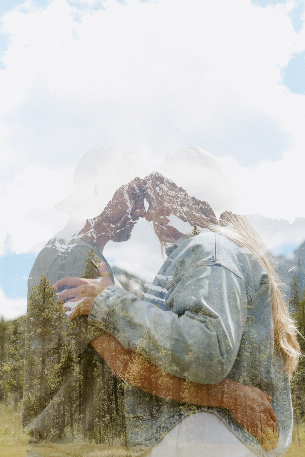 edited photo of man and woman hugging blended into the background of forest and mountains.