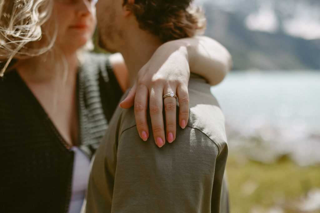 Close up of engagement ring on women's hands