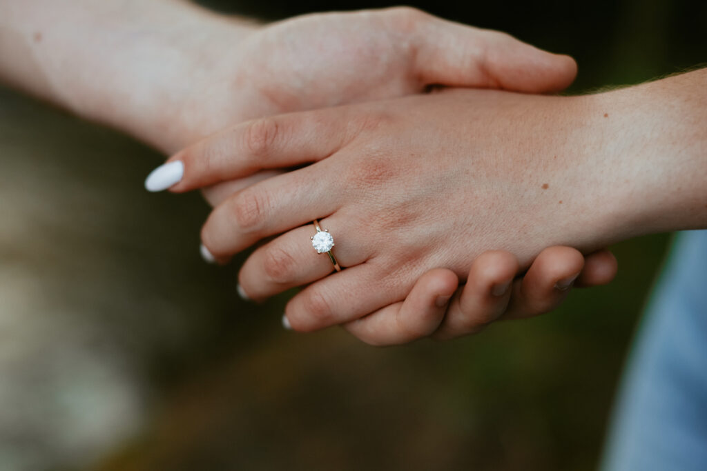 Close up on gold engagement ring 