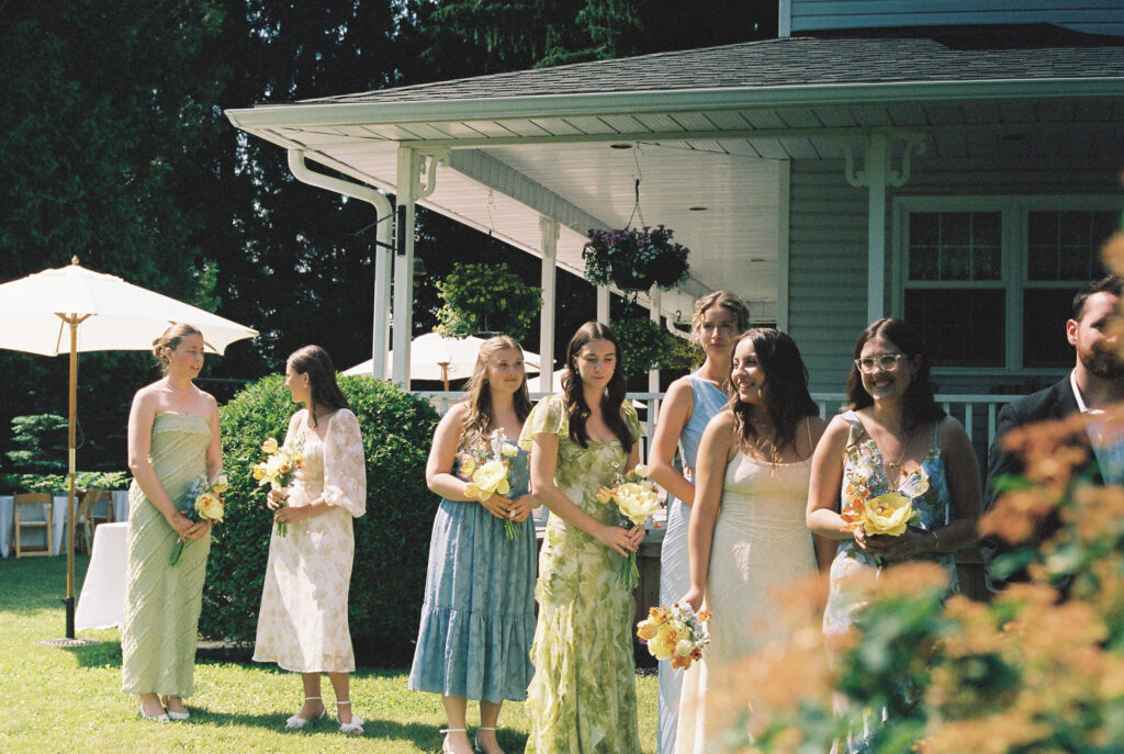 Bridesmaid gather ready to walk down the aisle. 