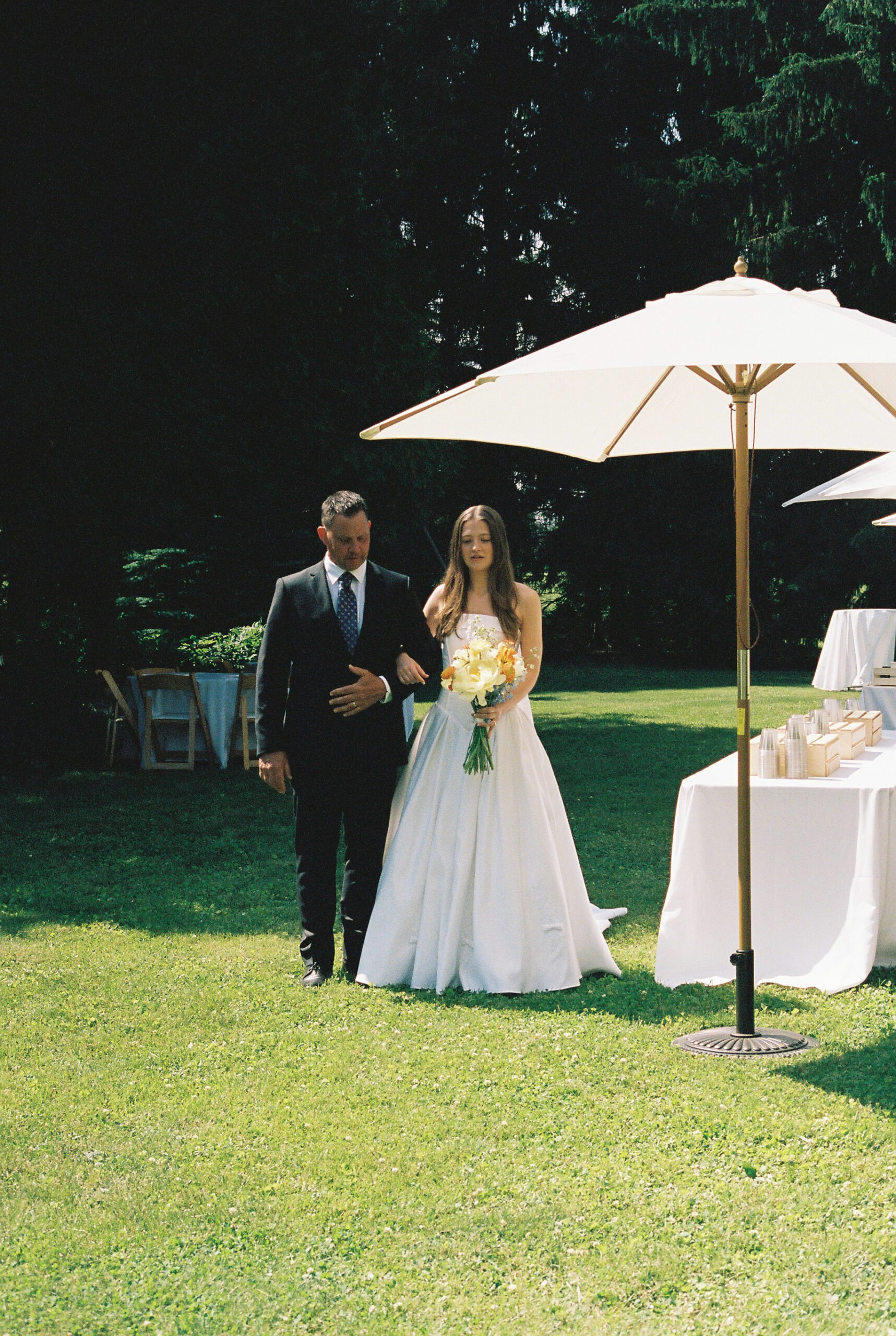 Bride walks down aisle with her father