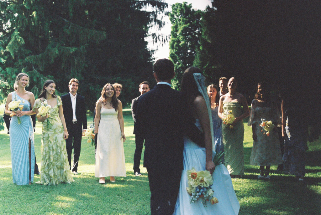 Bridal party gathers for a group picture 