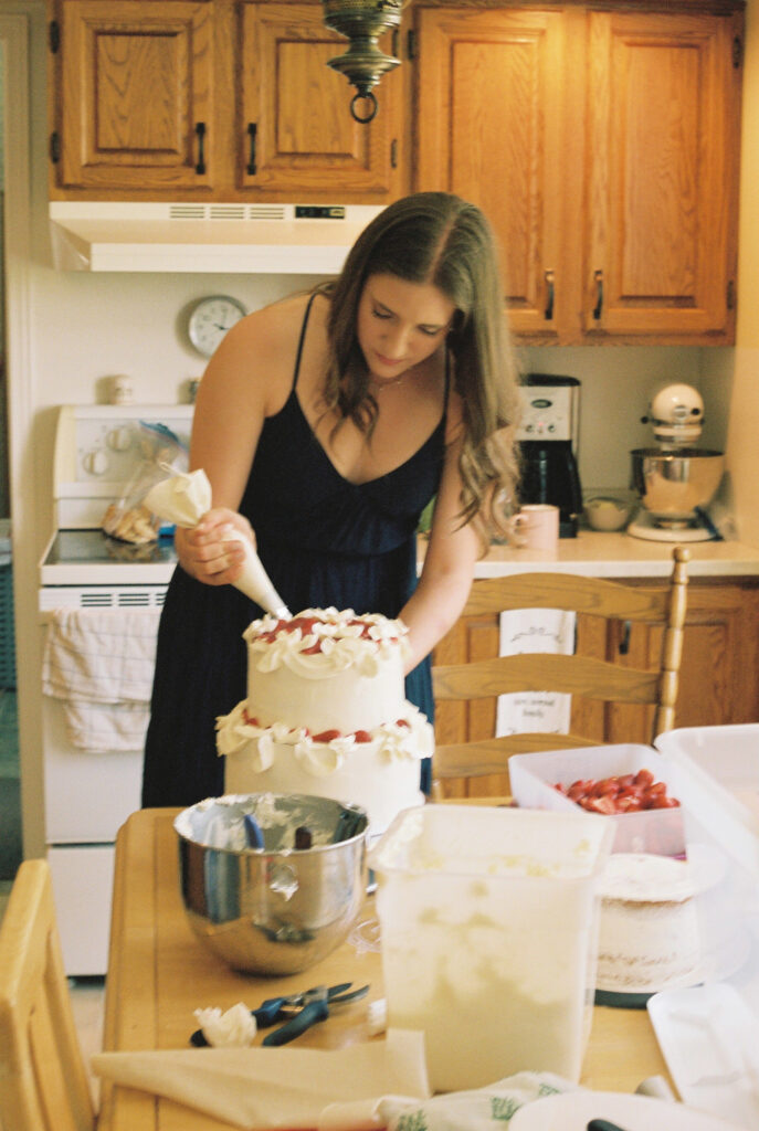 cake being decorated. 