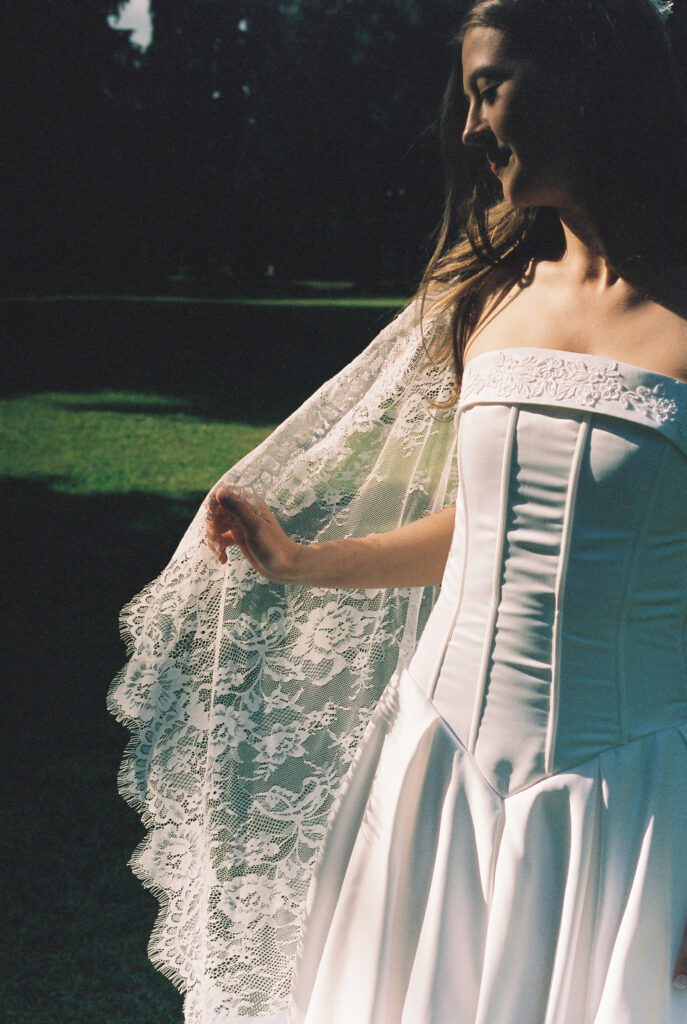 bride with lace veil, film photograph