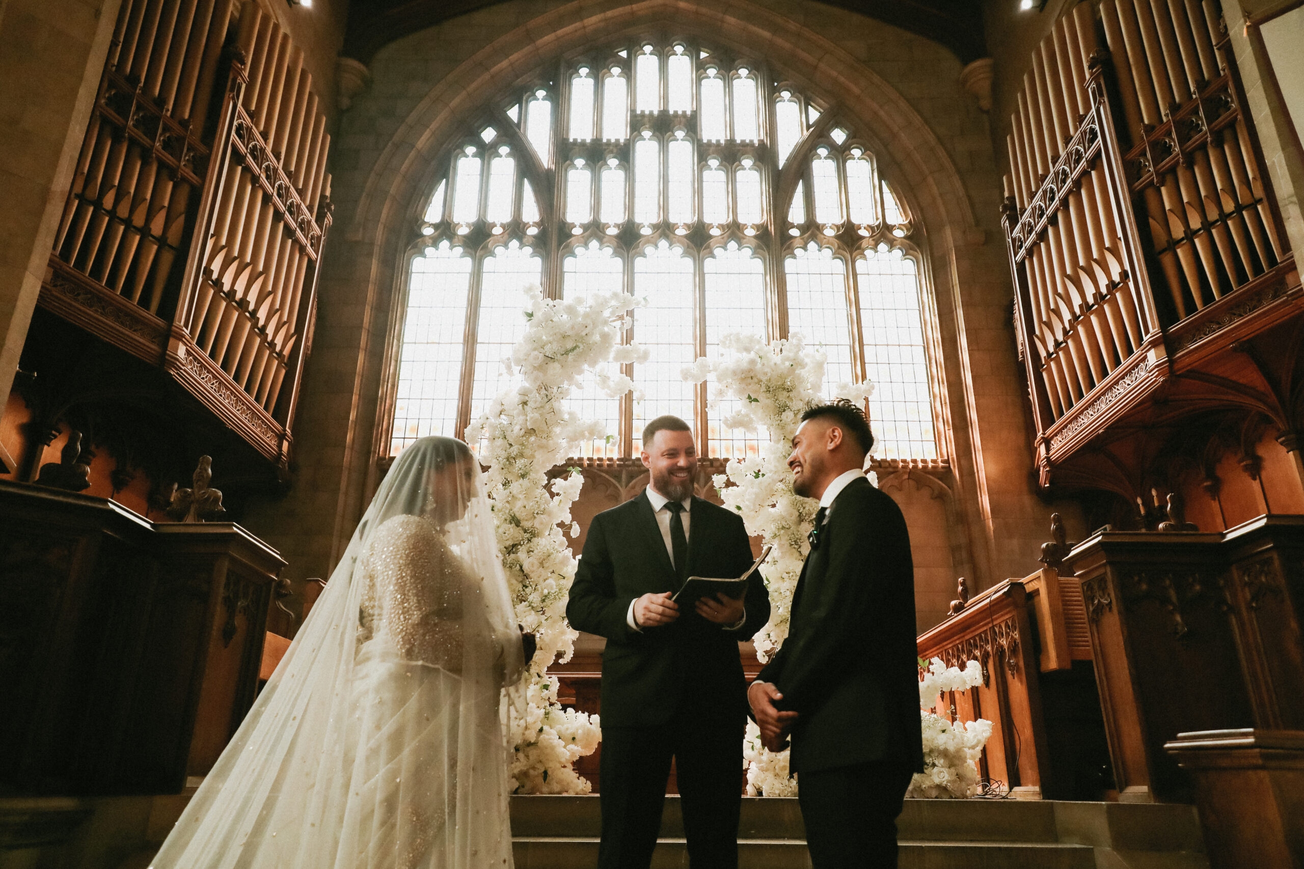 Trinity College Toronto University of Toronto wedding Toronto wedding photographer Moody wedding at Trinity College outside